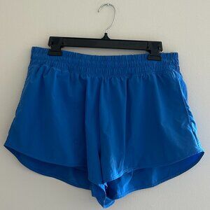 Offline by Aerie 2" hot stuff short in blue with pockets